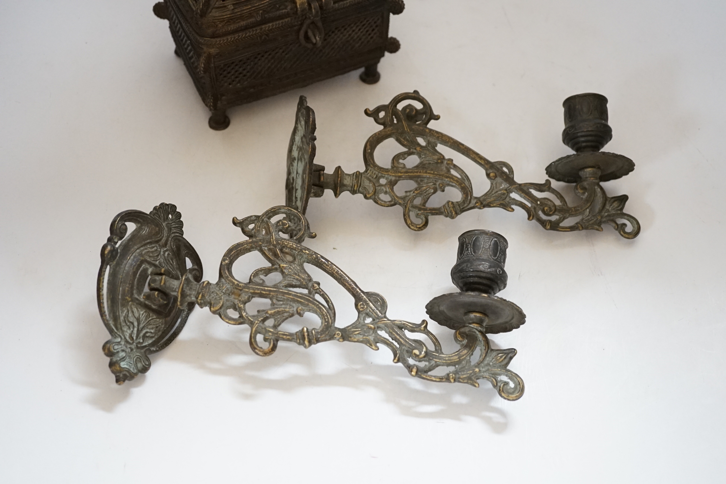 An African Benin style bronze casket and pair of wall sconces, 22cm